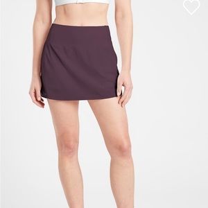 Athleta Size Medium Run with It Skort 14” The color is Agate Purple.